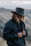 Ironbark leather hat worn outdoors | Clarke McKenzie Saddlery